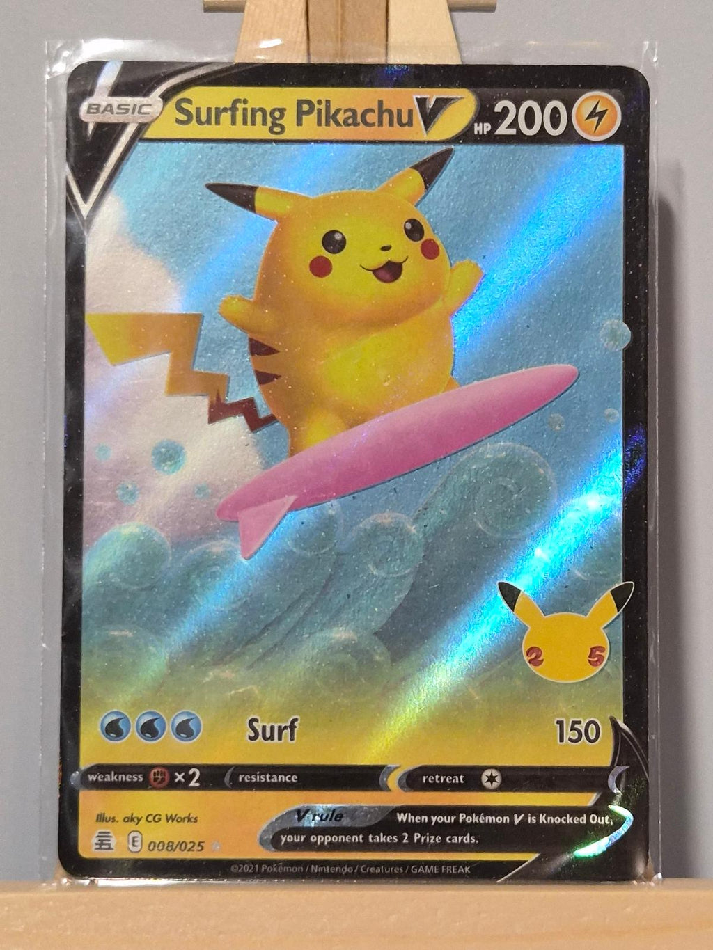 Surfing Pikachu V 008/025 Holo Celebrations NM/M